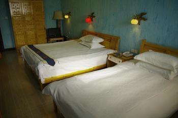 Nanshan Cottage Hotel Baisha (Yunnan) Bagian luar foto